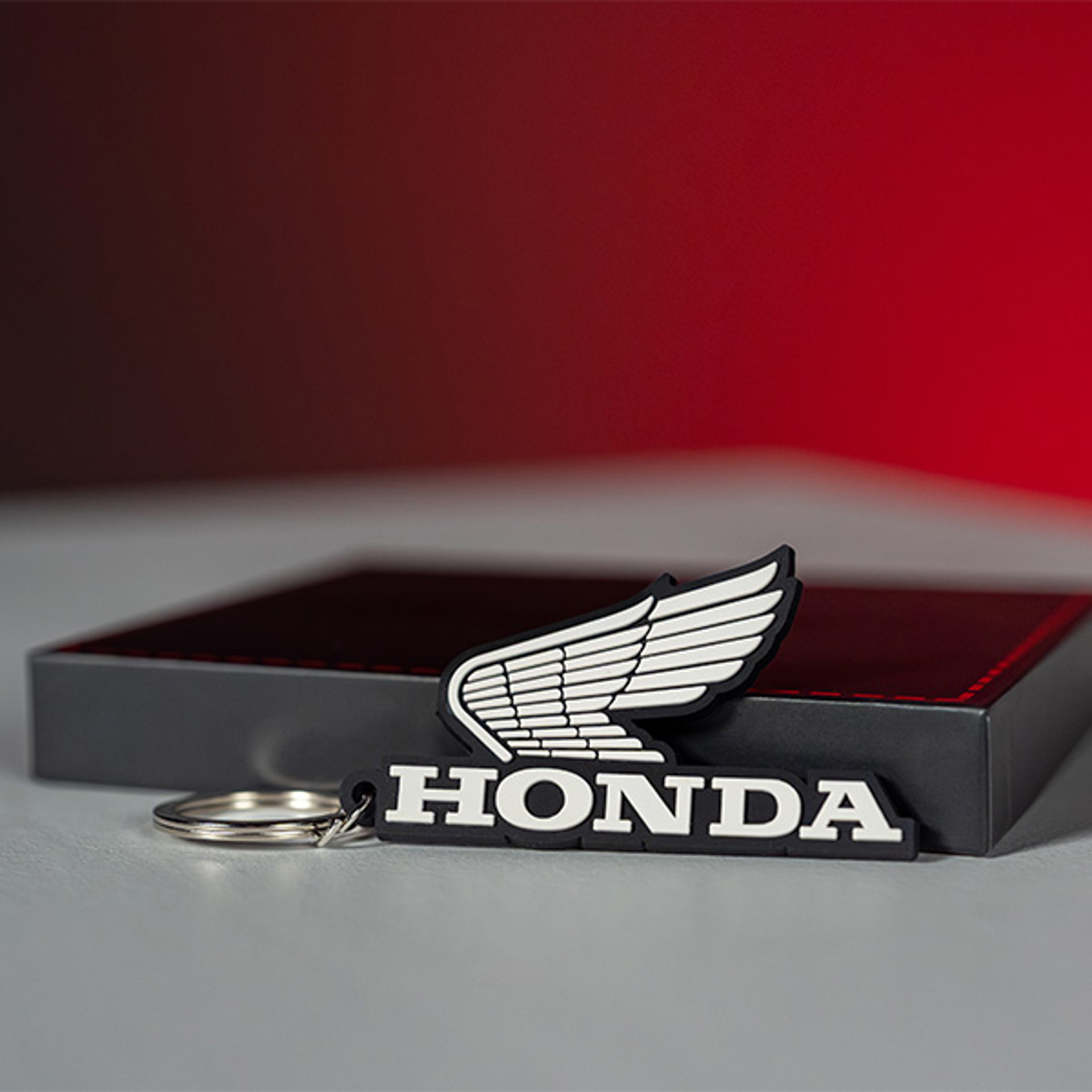 26YM Apparel Location Heritage 08AUD TAC 011 HONDA WING HTG RUBBER KEYRING.jpg